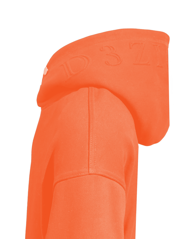 Detailed view of embossed pattern on D3ZIGNER Hoodie in Orange